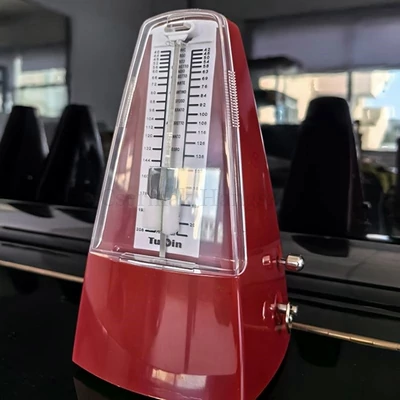 Metronóm mechanikus, ütemcsengővel, piros